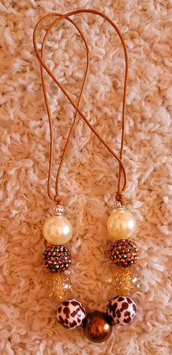 Brown Leopard and Pearl Necklace